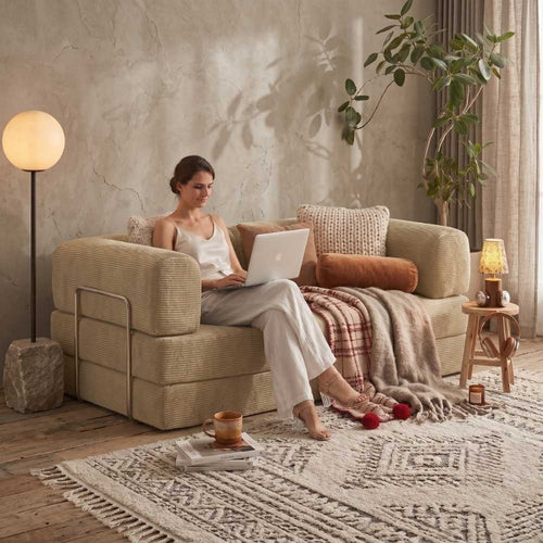 BOXY convertible sofa bed in cream white lifestyle setting